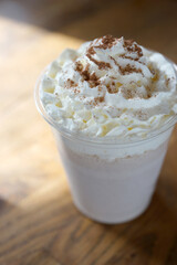 Chocolate milkshake sprinkled with cocoa