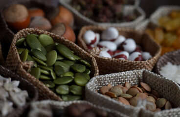 shop counter with a selection of nuts and cereals in vintage bags