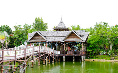 Fototapeta na wymiar Stilt house on the lake in Thailand