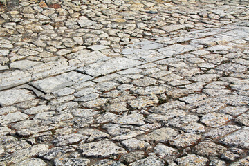 Stone background texture of the floor of the theater of The Palace of Knossos on Crete in Greece near Heraklion is called Europe’s oldest city and the ceremonial and political center of the Minoan civ