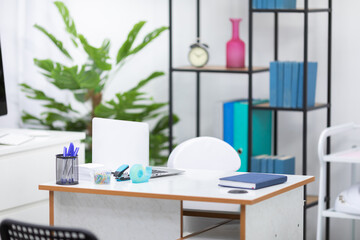 An empty doctor's room in a public hospital. Doctor's workspace