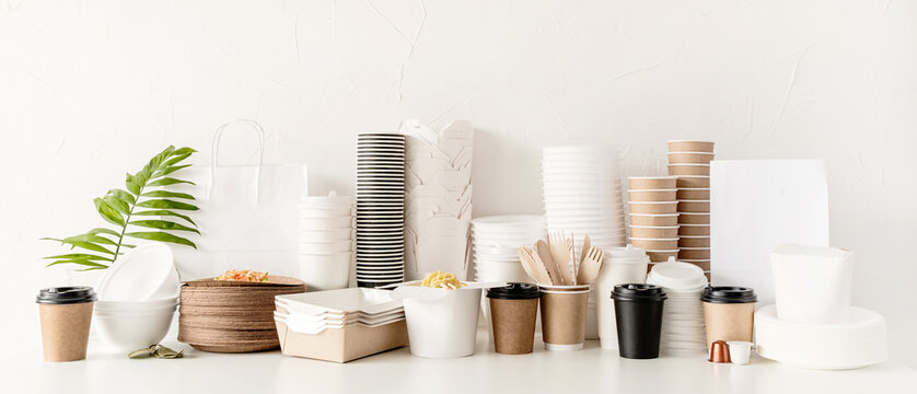 Eco friendly disposable tableware and eating utensils on table