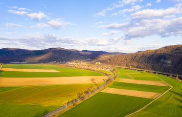 View of drone of landscape of river Weser and village Doelme  in Germany .