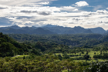 Fototapeta na wymiar Overlook with View of Tropical Forests and Jagged Mountains outside of Clark, Philippines - Pampanga, Luzon, Philippines 
