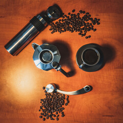 Happy face made from coffee brewing equipment and fresh cup of espresso.