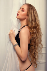 Beautiful girl posing in a photo studio