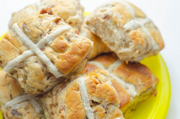 Traditional hot cross buns, bread with characteristic decoration in the shape of a cross
