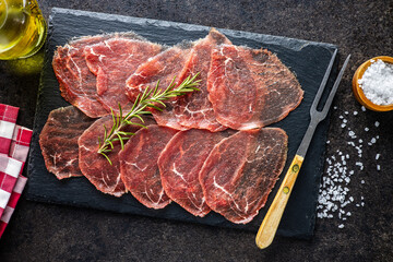 Fototapeta na wymiar Sliced carpaccio. Raw beef meat.