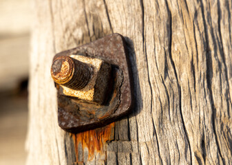 A closeup of a bolt on a jetty pylon  in victor harbor south australia on April 12th 2021