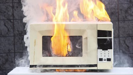 Microwave oven caught fire and caused domestic fire.