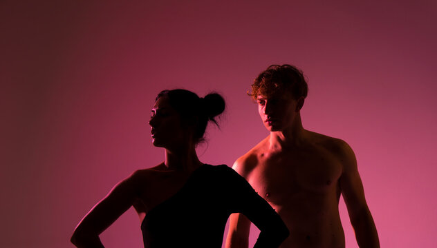 Coupel love. Neon studio. Light.  Couple in love. Background. 