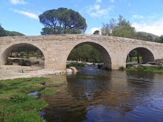 Fototapeta premium Old medieval bridge over the river