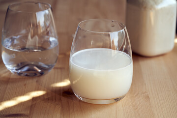 A glass of drink made from whey protein powder