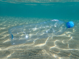 Pollution of the ocean with waste, plastic garbage and the threat to the environment, Plastic water bottles pollution in ocean (Environment concept), plastic in sea, plastic waste pollution underwater