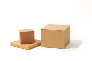 Close-up shot of different shaped cardboard boxes isolated on white background