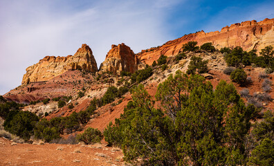 Fototapeta premium The Burr Trail through Long Canyon in Southern Utah, Red cliffs against blue sky's. 