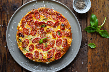 Courgette and roasted tomatoes frittata