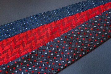 Three different mens neckties, stylish accessories, top view, flat lay. Fathers Day, shopping and greeting card concept