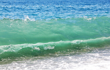 Sea waves of different shades of blue . Natural background.
