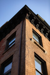 Tall building corner with bright shadow contrast