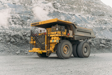 Komatsu 730e dump truck at a gold mining site.