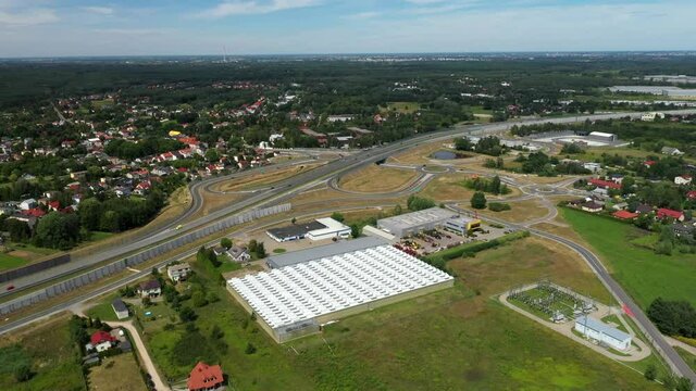 Logistic Park and Highway Exit at Expressway S8, Warsaw, Poland, Aerial Rising