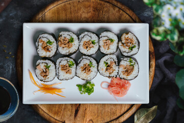 Top view of delicious maki sushi on a white plate © Rodolfo Lira/Wirestock