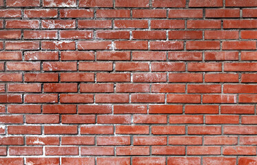 Modern brickwork. The surface of the bricks is stained from dampness.