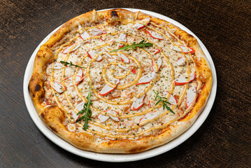 pizza on the wooden background