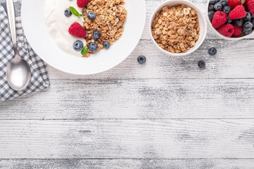 Healthy breakfast with baked granola and greek yogurt. Assorted fresh berries - Image