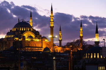 Picturesque view of illuminated ancient Suleymaniye Mosque in Fatih district of Istanbul at twilight, Turkey