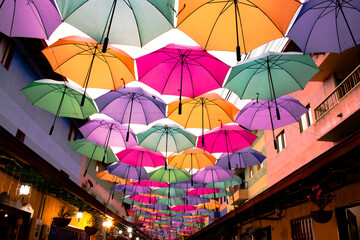 Fototapeta na wymiar top roof colorful umbrellas