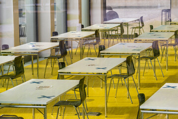 table and chairs arrangement during the corona virus pandemic restrictions