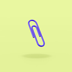 One Blue Paperclip on Green Background
