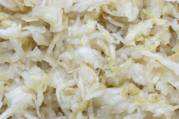 Closeup of fresh homemade sauerkraut. Sauerkraut is finely shredded raw cabbage that has been fermented by various lactic acid bacteria.