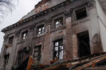Ruins of house after big disaster - fire. photo