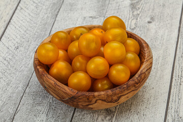 Fresh yellow cherry tomato heap