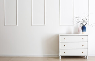 Chest of drawers in interior of modern room