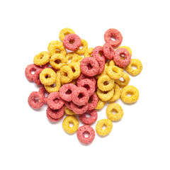 Heart made of tasty cereal rings on white background