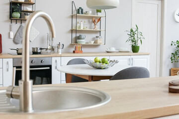 Sink in interior of modern kitchen