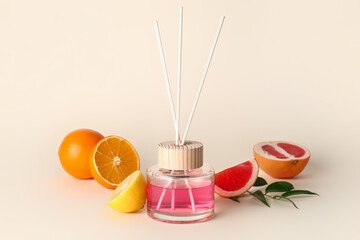 Citrus reed diffuser on light background