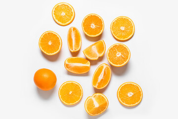 Obraz na płótnie Canvas Tasty oranges on white background