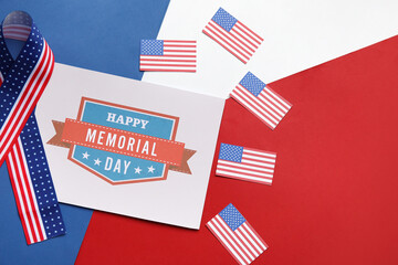 Greeting card for Memorial Day celebration with USA flags on color background