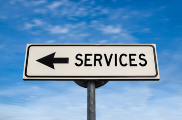 Services road sign, arrow on blue sky background. One way blank road sign with copy space. Arrow on a pole pointing in one direction.