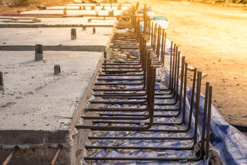 Obraz premium Reinforcement steel rod and deformed bar with rebar at construction site