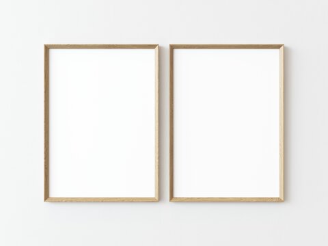 Two light wood rectangular vertical frames hanging on a white textured wall mockup, Flat lay, top view, 3D illustration