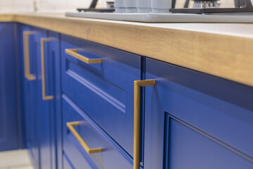 Original innovative kitchen cabinet handles. Kitchen design.