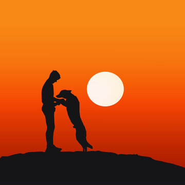 silhouette of a person and his pet dog on a rock with sunset view