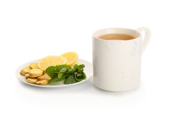 Cup of tea with ginger, mint and lemon on white background