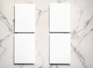 Blank sheets of paper on light background